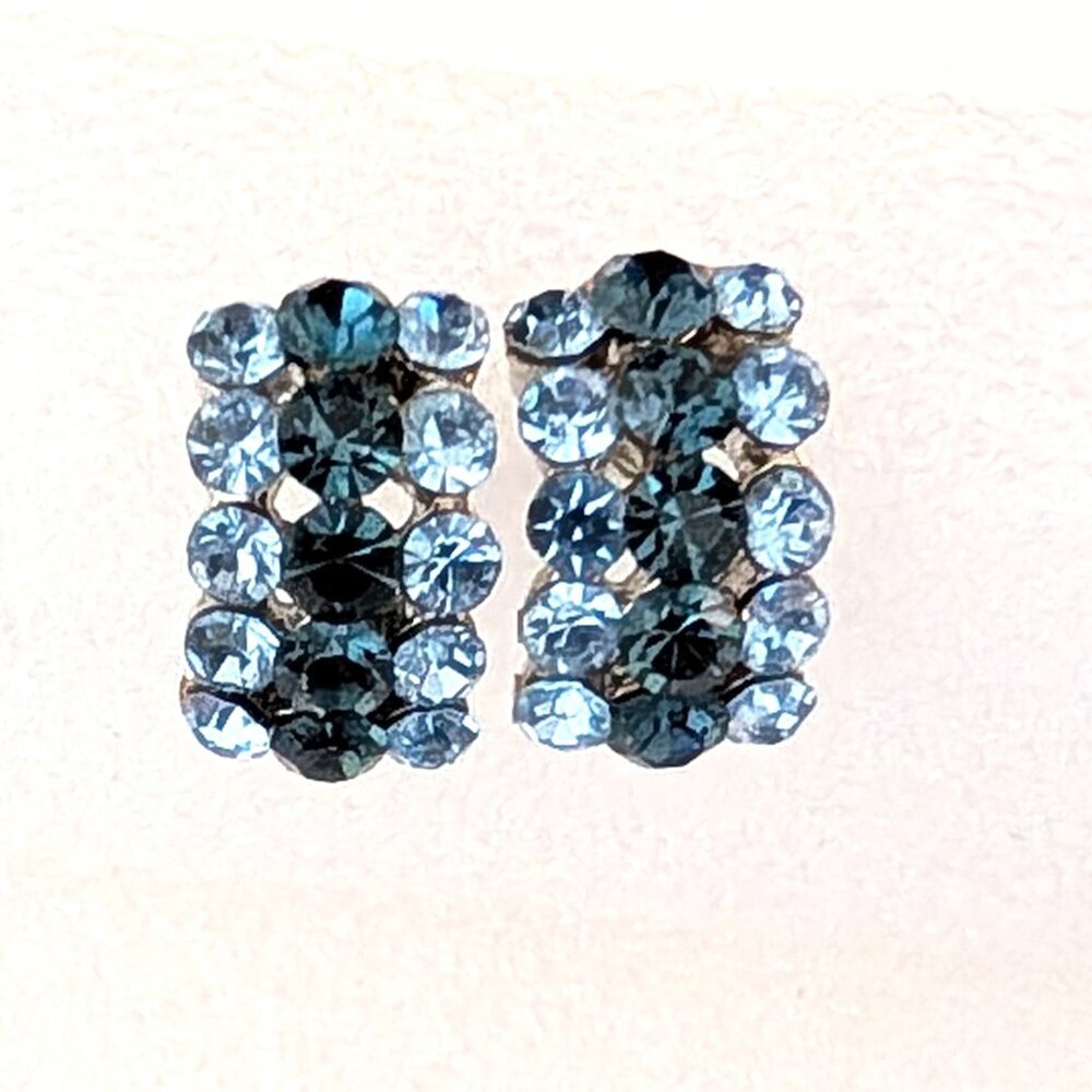 Small curved vintage light and dark blue cz earrings
